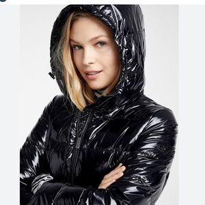 Woman Micheal Kors hooded  puffer jacket size large. Down/fathers fill no tags
